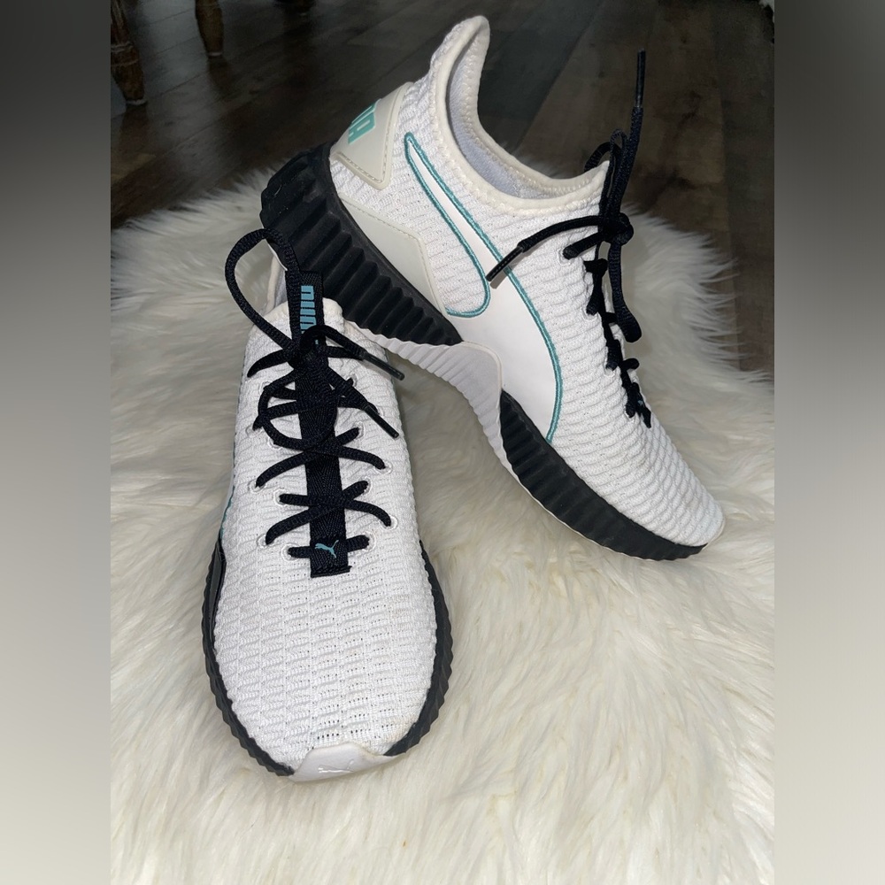 Puma Women’s Defy Sneaker